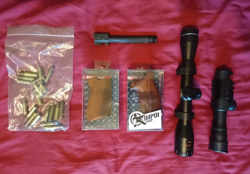 More information about "Various parts, Dan Wesson shells, Kimpoi shop grips, scopes, Mk23 steel outer"