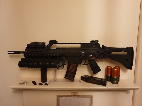More information about "WE G36k with railed forend, M203, 3x grenades, 2x mags"