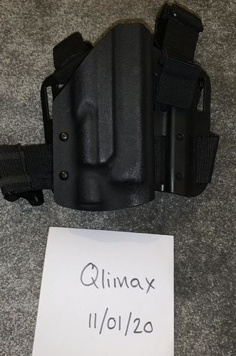 More information about "Kydex Glock Holster with Surefire X300 Torch and Dropleg Panel."