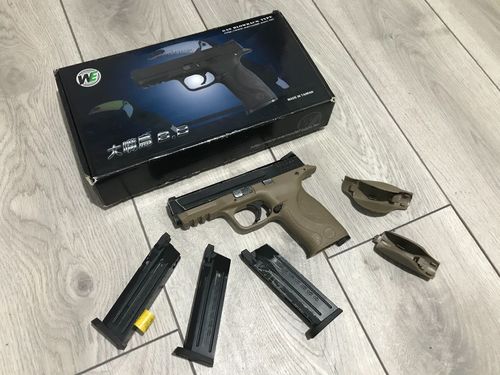 More information about "WE Toucan M&P9 clone Tan Grip."