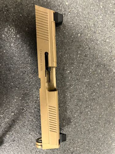 More information about "Wanted: TM fnx-45 slide"