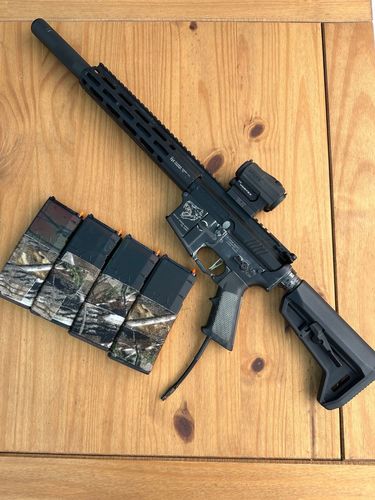 More information about "Wolverine MTW - Red Dot and 4 Magazines included."